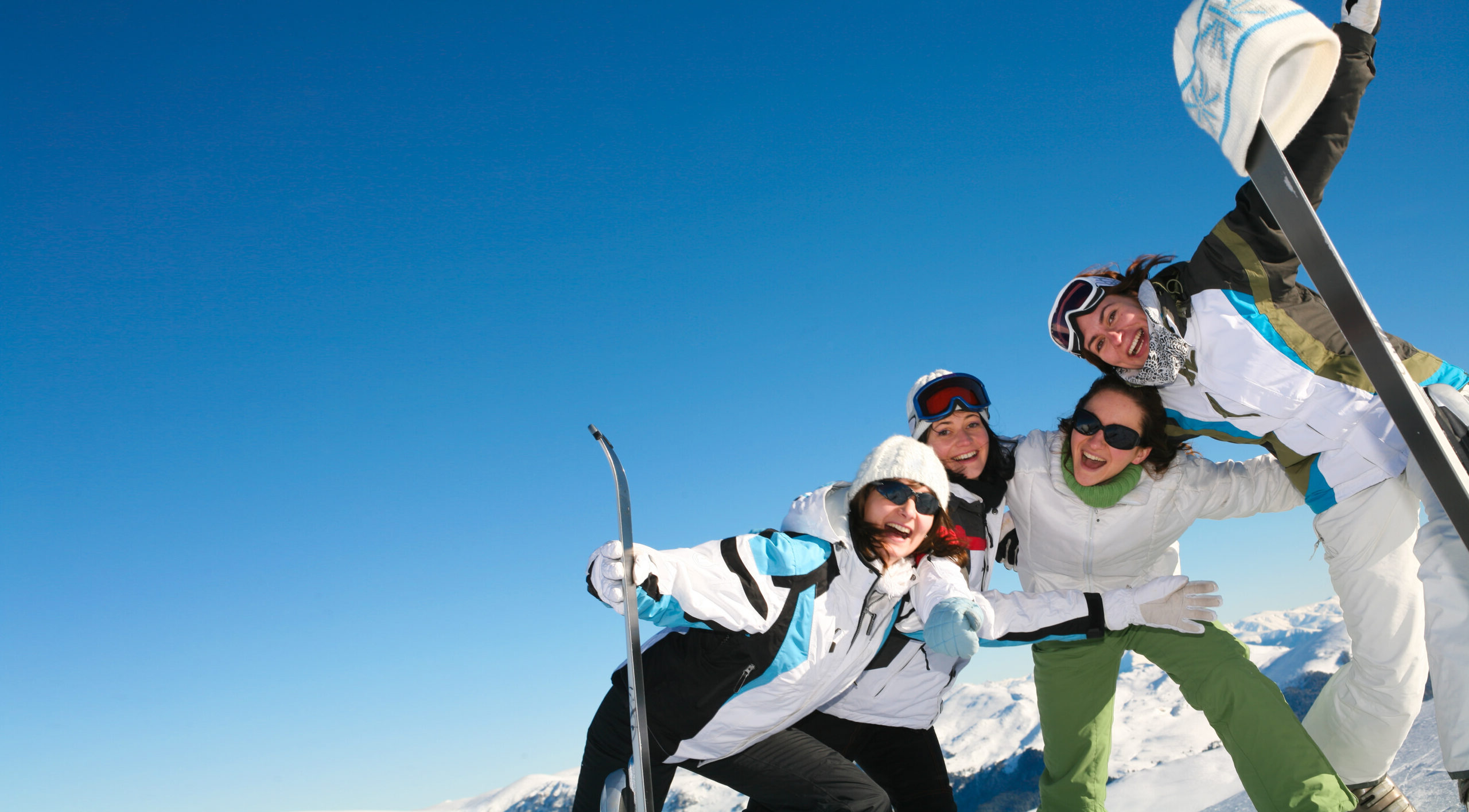 Four Friends Skiing - copy space